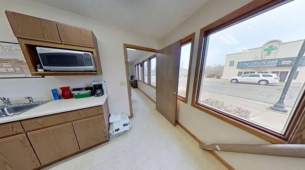 More Photos Of 207 N Main St, Olivet Auto Repair For Sale