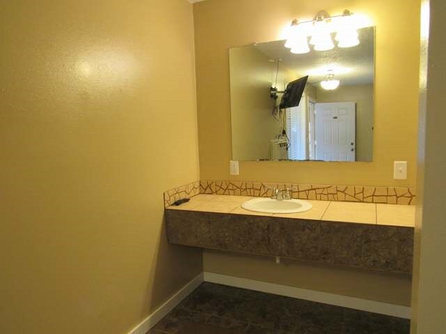 More Photos Of 681 7th St SW, Halliday Hotel For Sale