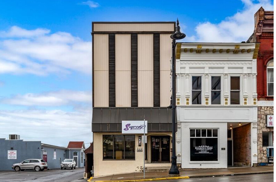 Primary Photo Of 332 S Main St, Butler Storefront Retail Residential For Sale