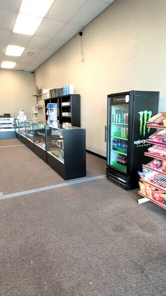 Primary Photo Of 9322 N Oak Trfy, Kansas City General Retail For Lease