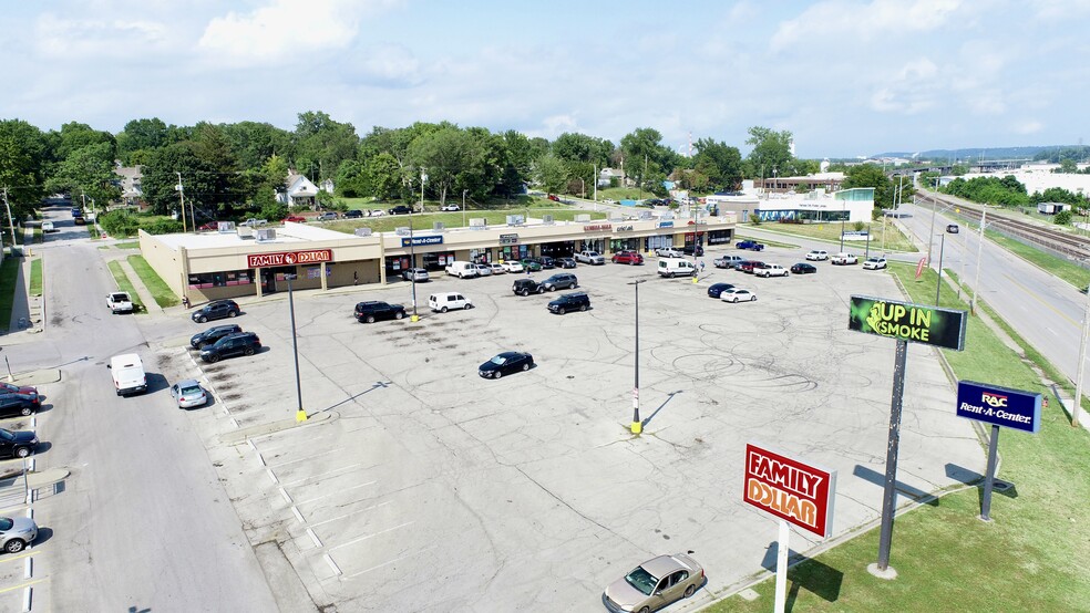 Primary Photo Of 5900-5930 Wilson Rd, Kansas City Storefront For Sale