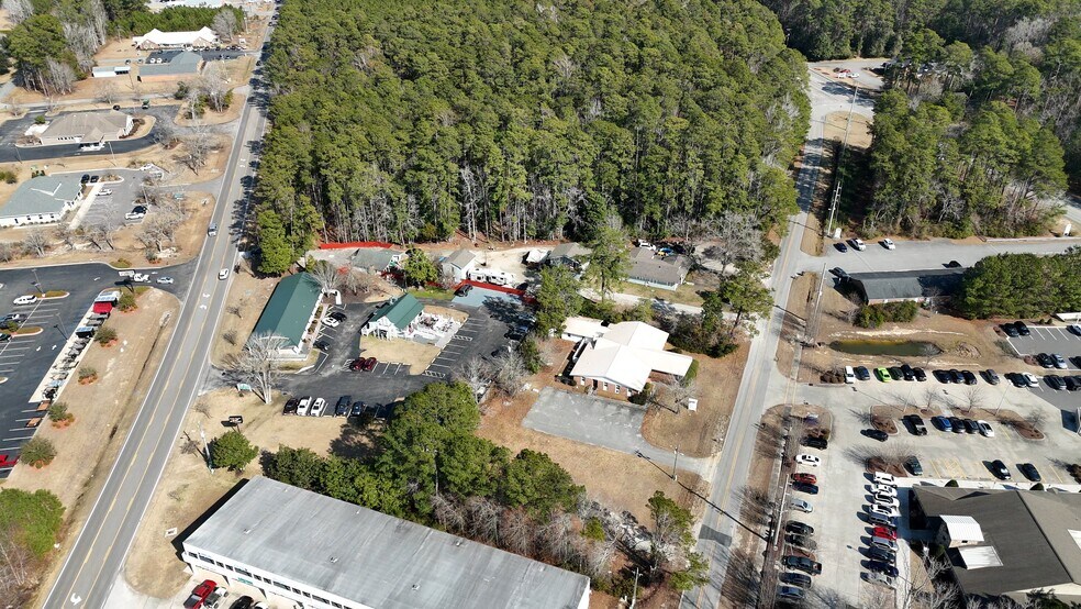 Primary Photo Of 5211 Main St, South Brunswick Storefront Retail Office For Sale