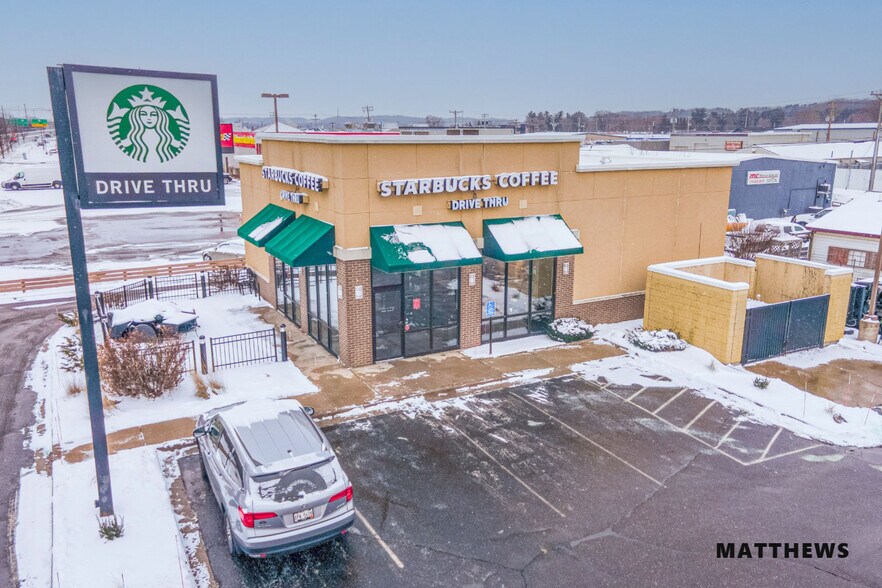 Primary Photo Of 2016 S Hastings Way, Eau Claire Freestanding For Sale