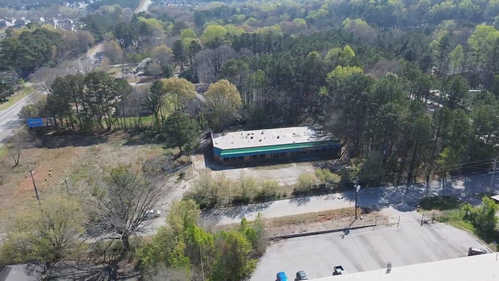 Primary Photo Of 106 Commerce St, Fayetteville Storefront Retail Office For Sale