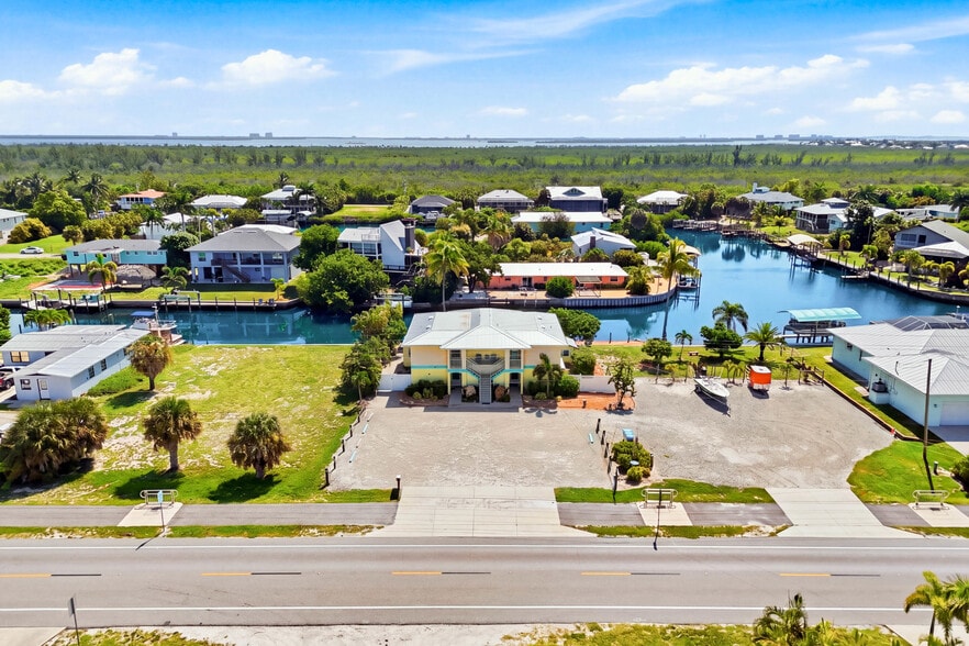 Primary Photo Of 3226 Stringfellow Rd, Saint James City Apartments For Sale