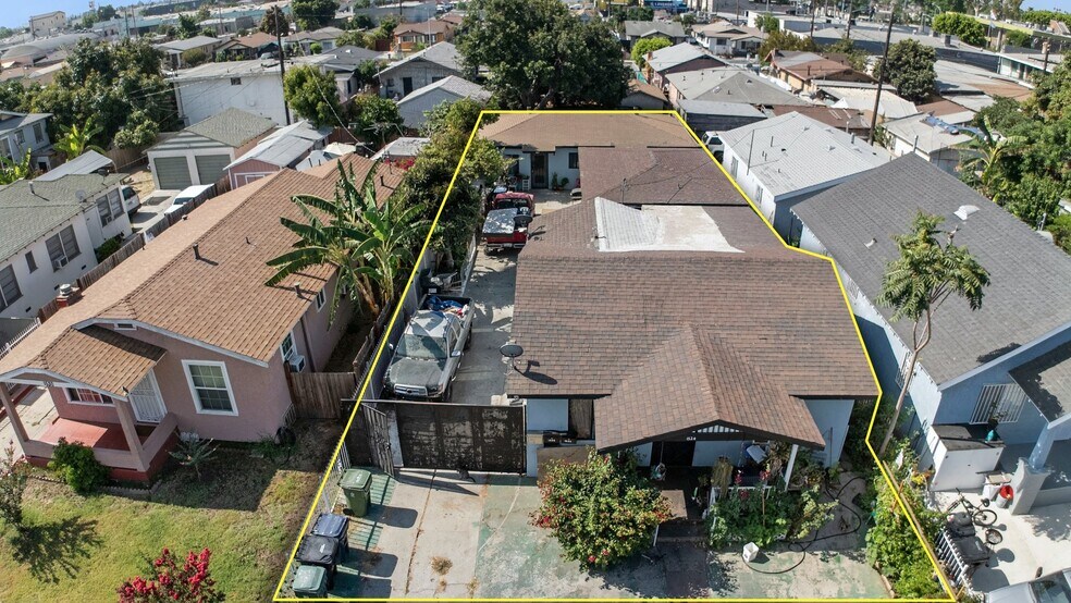 Primary Photo Of 1526 E 77th Pl, Los Angeles Multifamily For Sale