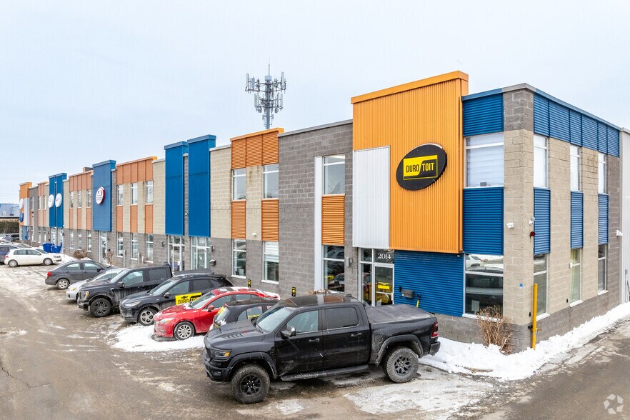 Primary Photo Of 1990-2014 Rue Michelin, Laval Warehouse For Sale