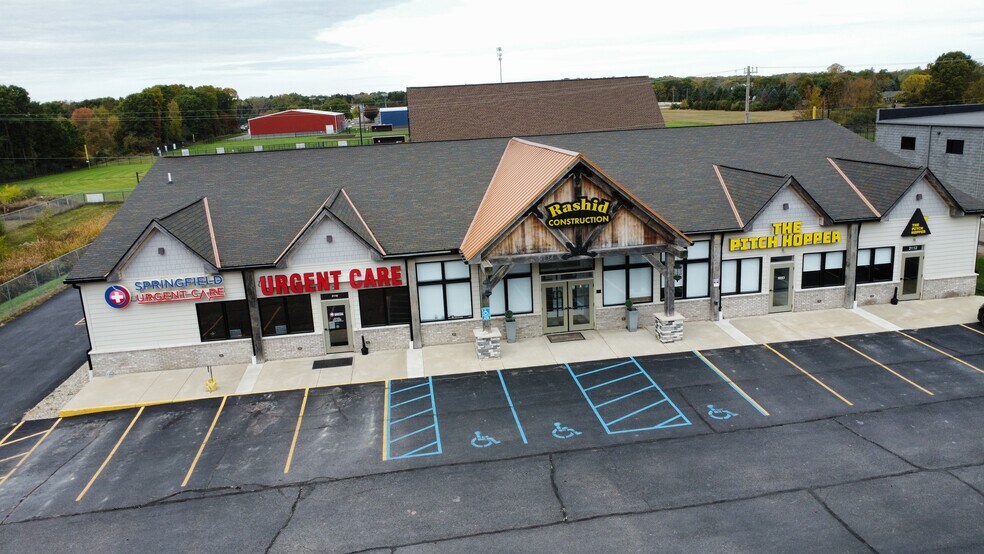 Primary Photo Of 2112 S Milford Rd, Highland Township General Retail For Sale