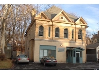 Primary Photo Of 610 Oak St, Syracuse General Retail For Sale