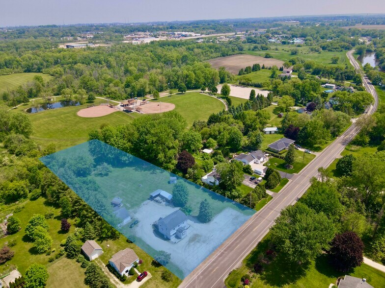 Primary Photo Of 3172 N Riverside Dr, Saukville General Retail For Lease