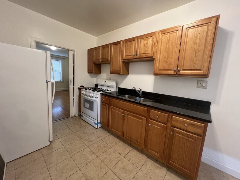 More Photos Of 5647 W Wellington Ave, Chicago Apartments For Sale