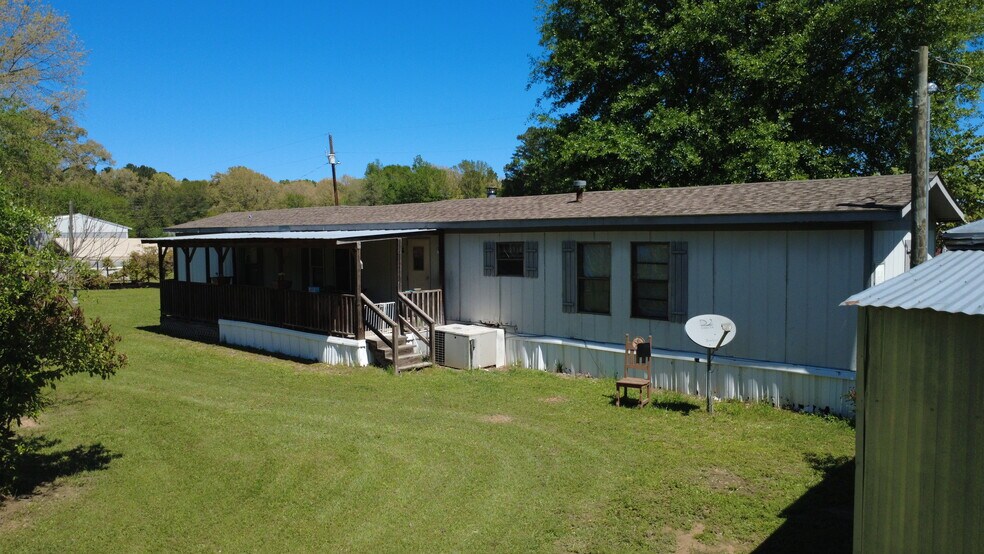 More Photos Of 8719 Pearson Rd, Ore City Warehouse For Sale