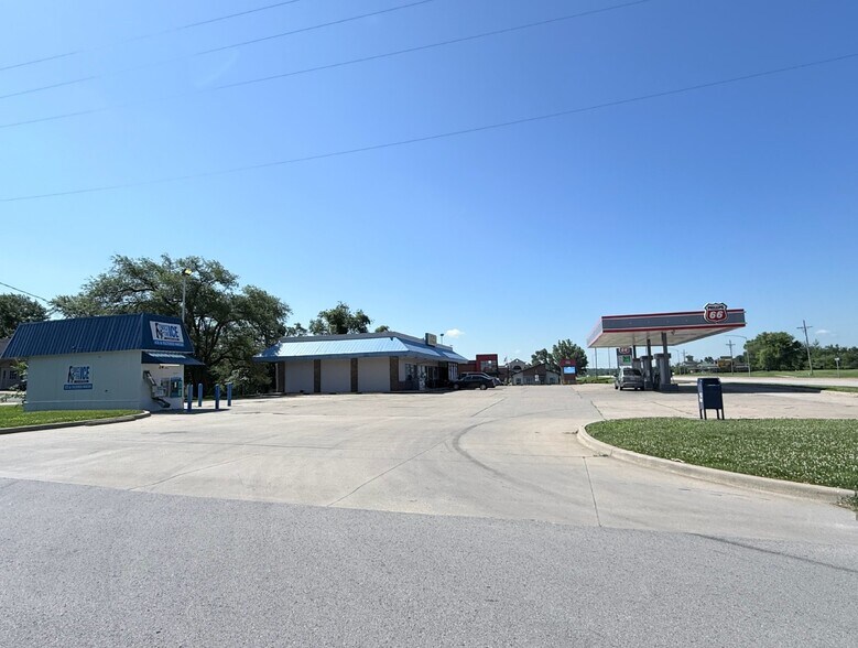 Primary Photo Of 601 S Main St, Lansing Convenience Store For Sale