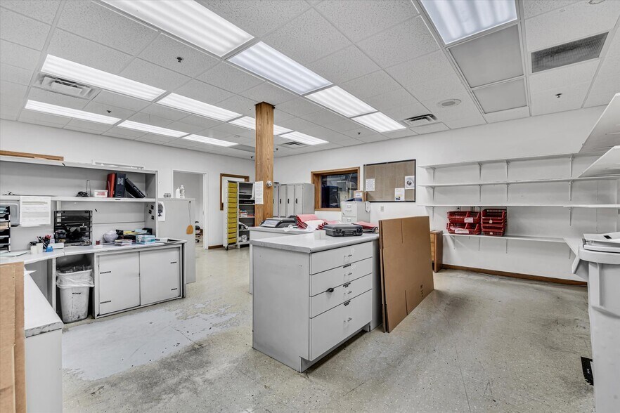 Primary Photo Of 202 1st St S, Kalona Manufacturing For Sale