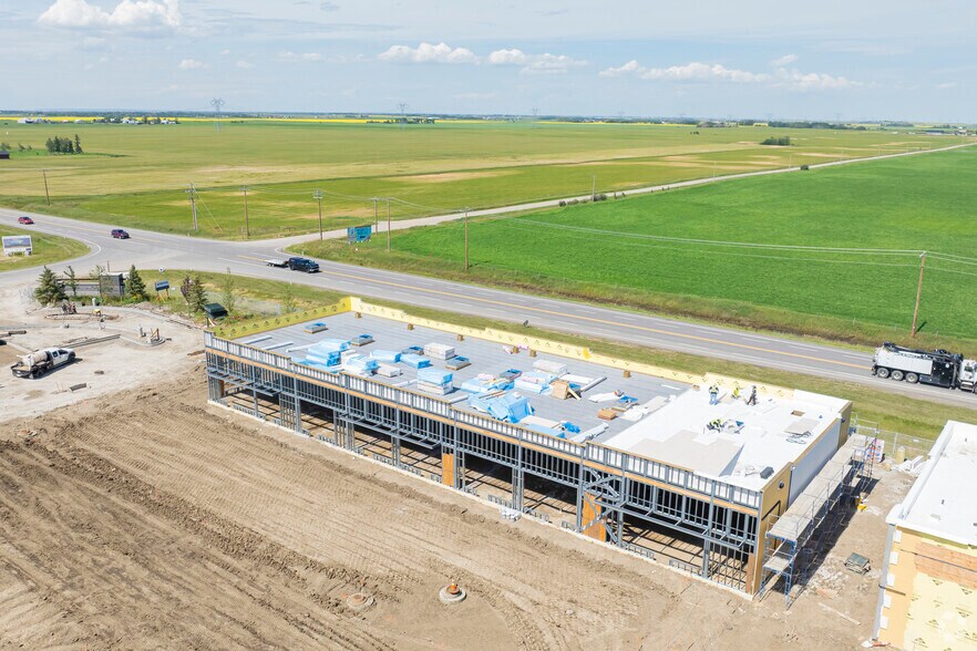 More Photos Of 272257 Glenmore Trl SE, Rocky View No 44 Storefront For Lease