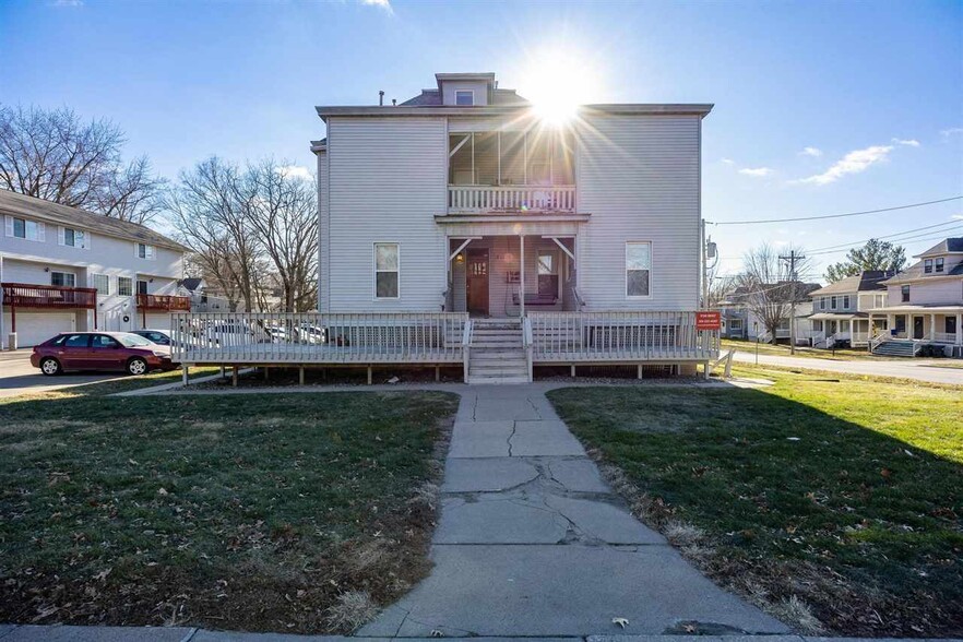 Primary Photo Of 711 E Burlington St, Iowa City Apartments For Sale