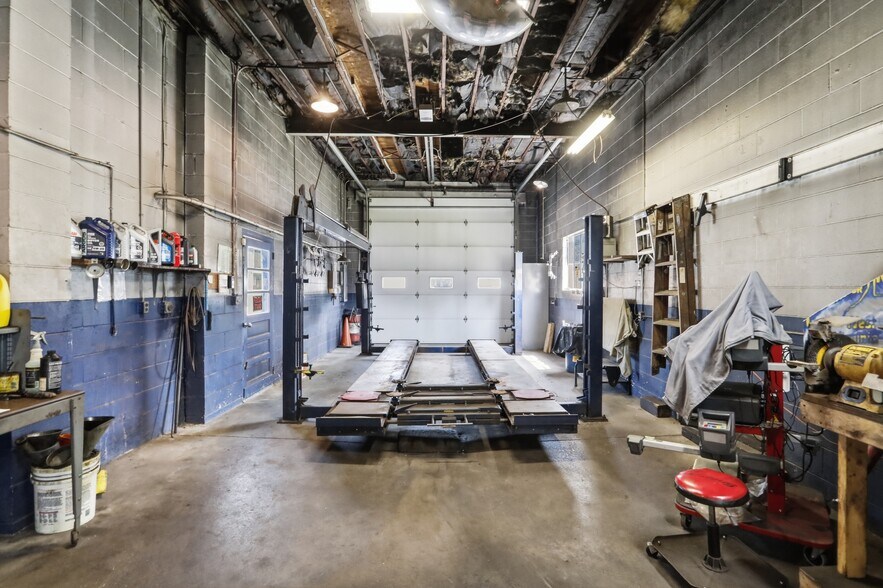 More Photos Of 455 Center Ave, Romney Auto Repair For Sale