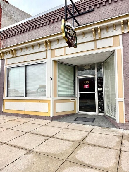 Primary Photo Of 335 River St, Manistee Storefront For Sale