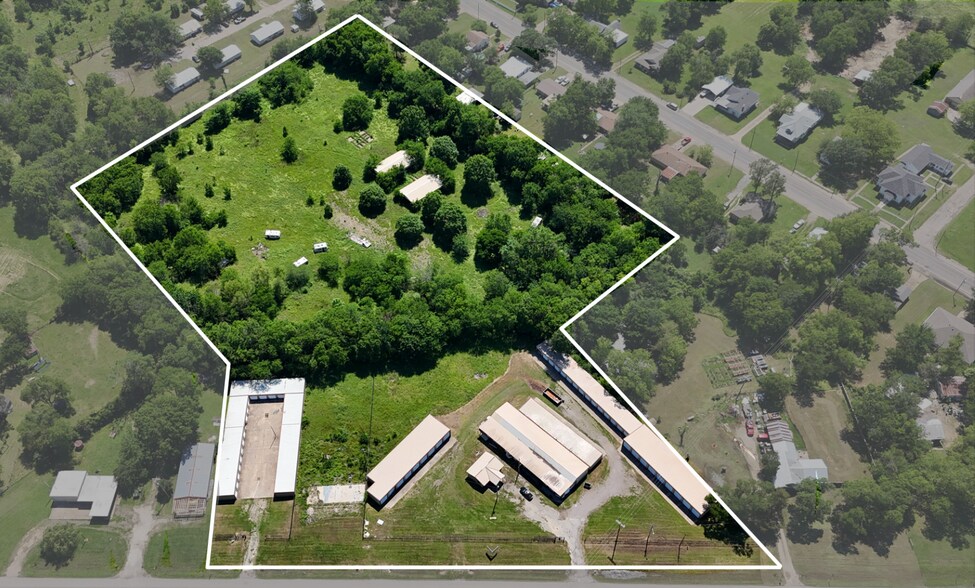 Primary Photo Of 118 E US Highway 69, Point Self Storage For Sale