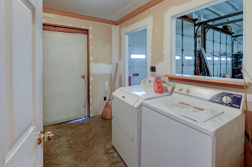 More Photos Of 355 Trackside Dr, Peculiar Warehouse For Sale