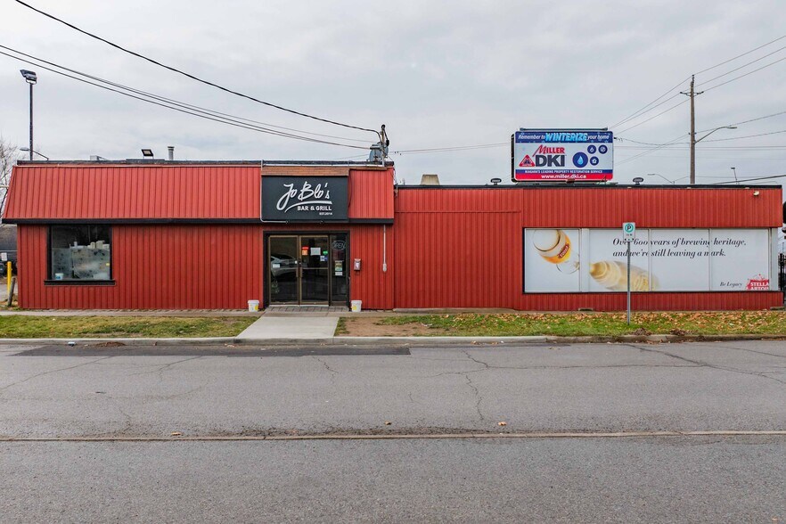 Primary Photo Of 231 St Paul St W, St Catharines General Retail For Sale