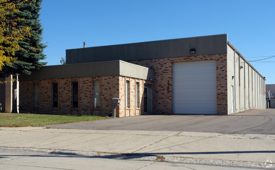 Primary Photo Of 24808 Romano St, Warren Manufacturing For Lease