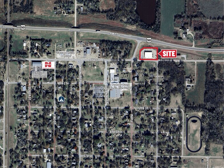 Primary Photo Of 309 E 9th St, Peabody Storefront For Sale