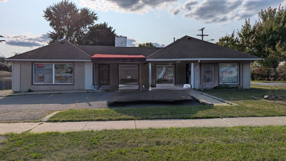 Primary Photo Of 6985 N Merriman Rd, Garden City Storefront Retail Office For Sale