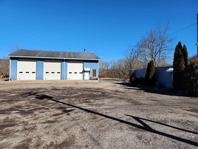 Primary Photo Of 2384 W 23rd St, Bellaire Warehouse For Sale