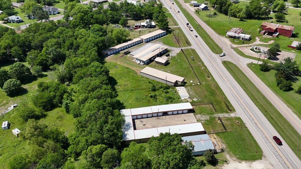 More Photos Of 118 E US Highway 69, Point Self Storage For Sale