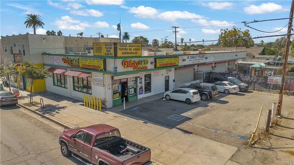 Primary Photo Of 4419 S Normandie Ave, Los Angeles General Retail For Sale