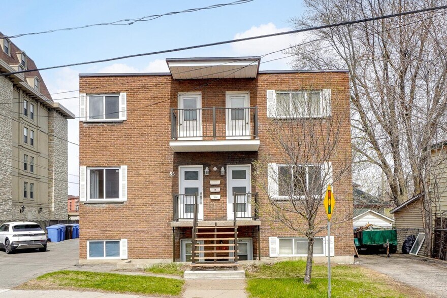 More Photos Of 51 Boul Desjardins E, Sainte-therese Apartments For Sale