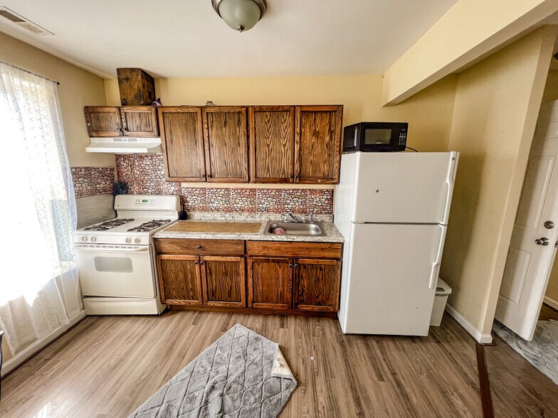 More Photos Of 1236-1238 1236-1238 E Belvedere Avenue Ave, Baltimore Multifamily For Sale