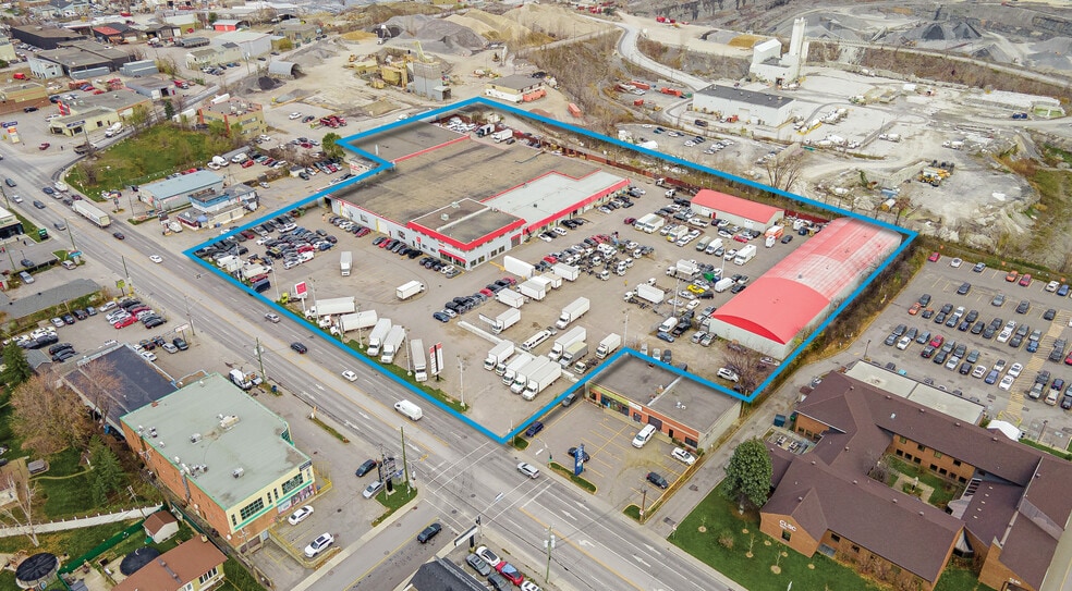 Primary Photo Of 1385 Boul Des Laurentides, Laval Warehouse For Sale