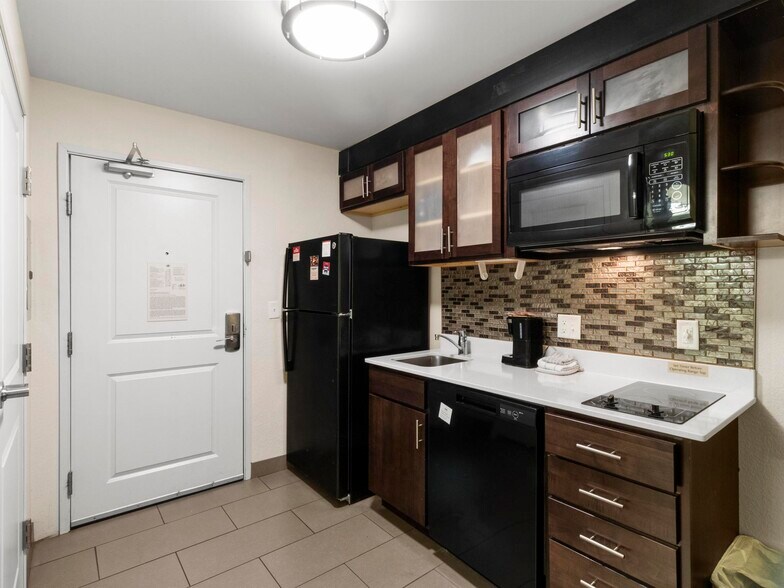 More Photos Of 1220 E Douglas Rd, Granger Hotel For Sale