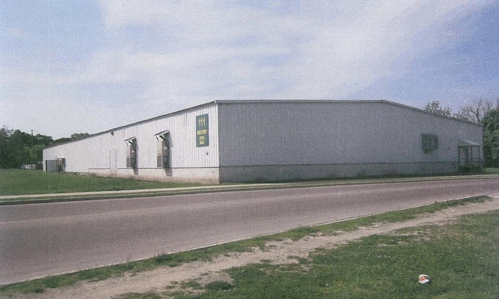 Primary Photo Of 111 W River St, Cadillac Distribution For Sale