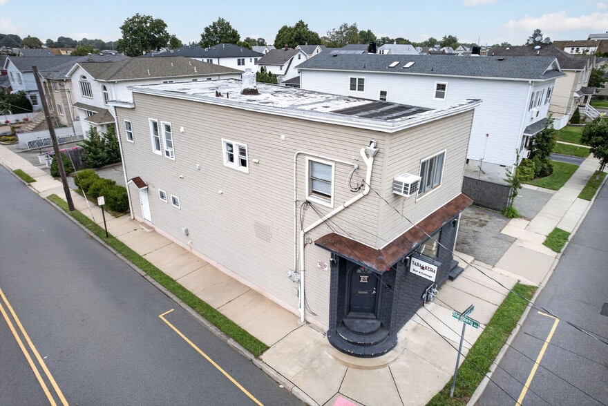 Primary Photo Of 323 Semel Ave, Garfield Storefront Retail Residential For Sale