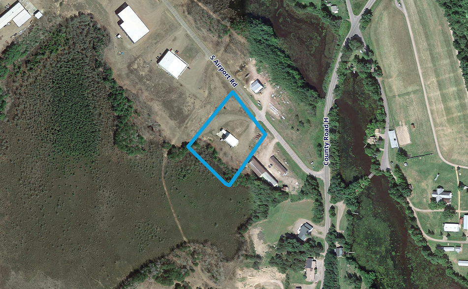 Primary Photo Of 310 S Airport Rd, Phillips Land For Sale