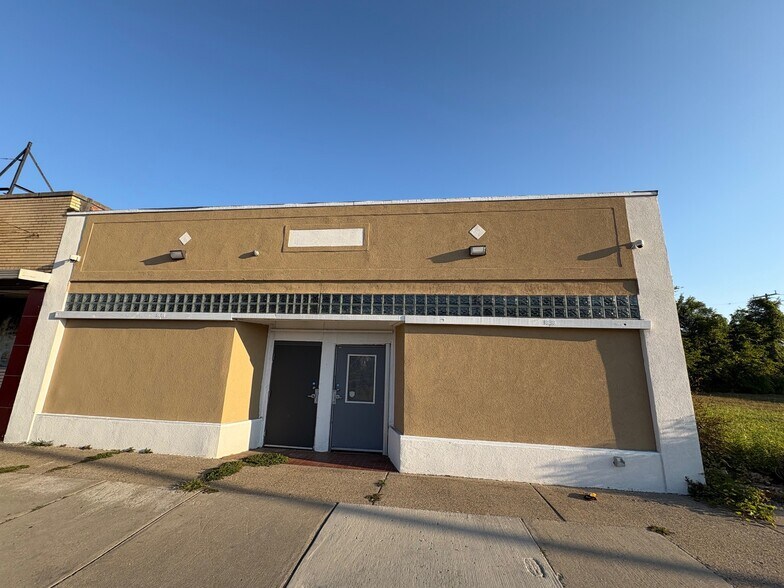 Primary Photo Of 5117-5121 E 7 Mile Rd, Detroit Storefront For Sale