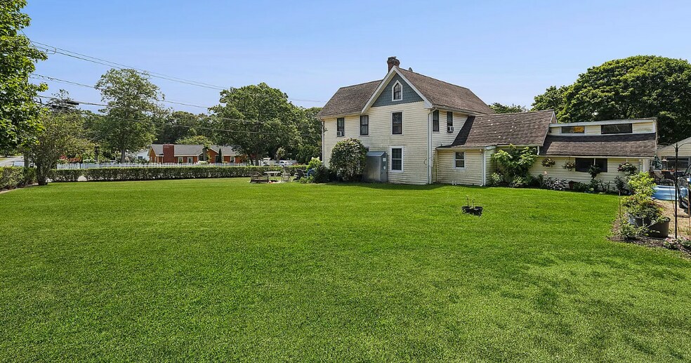 More Photos Of 134 Ponquogue Ave, Hampton Bays Apartments For Sale