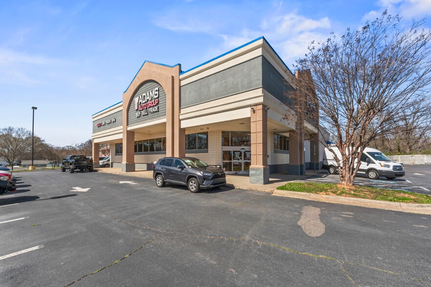 Primary Photo Of 520 E Trade St, Dallas Auto Dealership For Sale