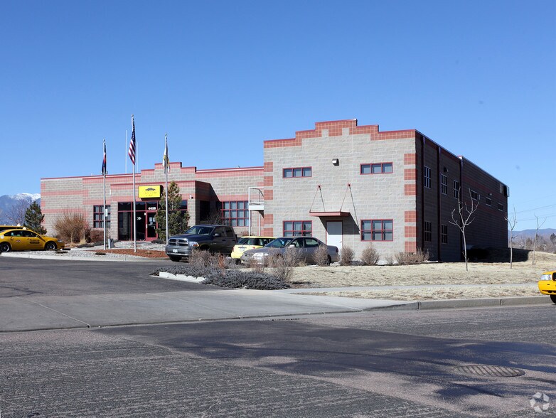 Primary Photo Of 4625 Town Center Dr, Colorado Springs Service For Sale