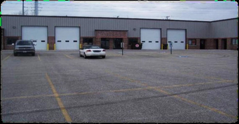 More Photos Of 155 E Chicago St, Cary Warehouse For Lease