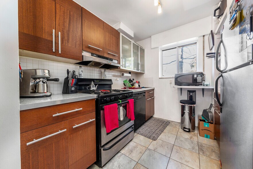 More Photos Of 66-14-66-16 49th Ave, Woodside Multifamily For Sale