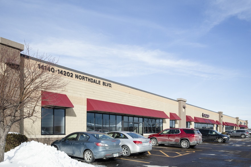 More Photos Of 14140-14198 Northdale Blvd, Rogers Showroom For Lease