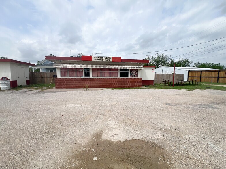 Primary Photo Of 302 E Omega St, Henrietta General Retail For Sale