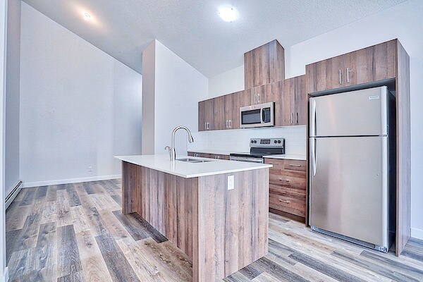 More Photos Of 303 Waddy Lane, Strathmore Multifamily For Sale