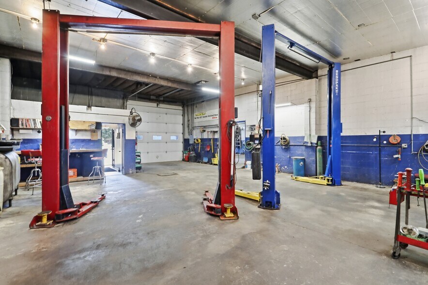 More Photos Of 455 Center Ave, Romney Auto Repair For Sale