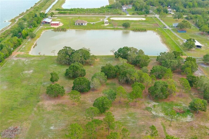 More Photos Of 2310 70th Ave NE, Naples Specialty For Sale