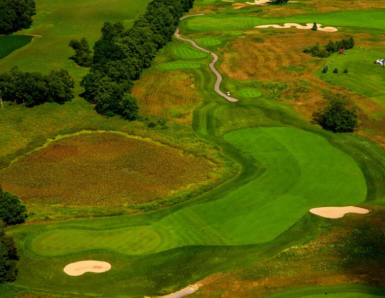 More Photos Of 61809 Stonegate Dr, Centreville Golf Course Driving Range For Sale